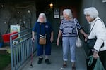 (Left to right) Ann Cape, Betty Schallhorn and Marjorie Taray leave a social event at the Senior Community Center in Monmouth. The number of Oregonians over 65 outnumber the number of children in the state.