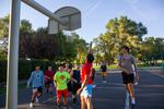 A group of current and former Madras High School students plays basketball at Sahalee Park in Madras, Ore., on Sept. 1, 2020.