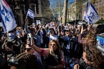 Pro-Israel demonstrators chant "Shame" in support of Columbia University assistant professor Shai Davidai, who was denied access to the main campus to prevent him from accessing the lawn currently occupied by pro-Palestine student demonstrators in New York on Monday, April 22, 2024.