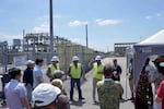 Washington city and state leaders, utility officials and clean energy advocates toured a large battery energy storage facility in Houston, Texas, during a group study mission in May.