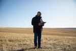 Sherman County Judge Joe Dabulskis uses an iPad in Moro, Ore., Wednesday, Nov. 11, 2020. Sherman County is using solar-powered trailers to help fill internet dead zones.