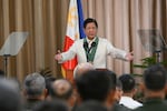 Philippines' President Ferdinand Marcos Jr. gestures to army officers as he delivers a speech during the 128th founding anniversary of the Philippine army at its headquarters in Manila on March 22.
