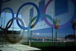 FILE - The Olympic rings are visible at the Roucas Blanc Marina constructed for the upcoming summer Olympic Games in Marseille, southern France, Tuesday, April 2, 2024. Marseille will host the Olympic sailing events during the Paris 2024 Olympic Games that run from July 26 to Aug.11, 2024.