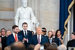 President-elect Donald J. Trump, from right, along with his son Barron Trump and Vice President-elect JD Vance, arrive for the 60th Presidential Inauguration in the Rotunda of the U.S. Capitol in Washington, Monday, Jan. 20, 2025.