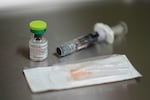 FILE - A vial of the measles, mumps and rubella (MMR) vaccine is pictured at International Community Health Services, Wednesday, Sept. 10, 2025, in Seattle.