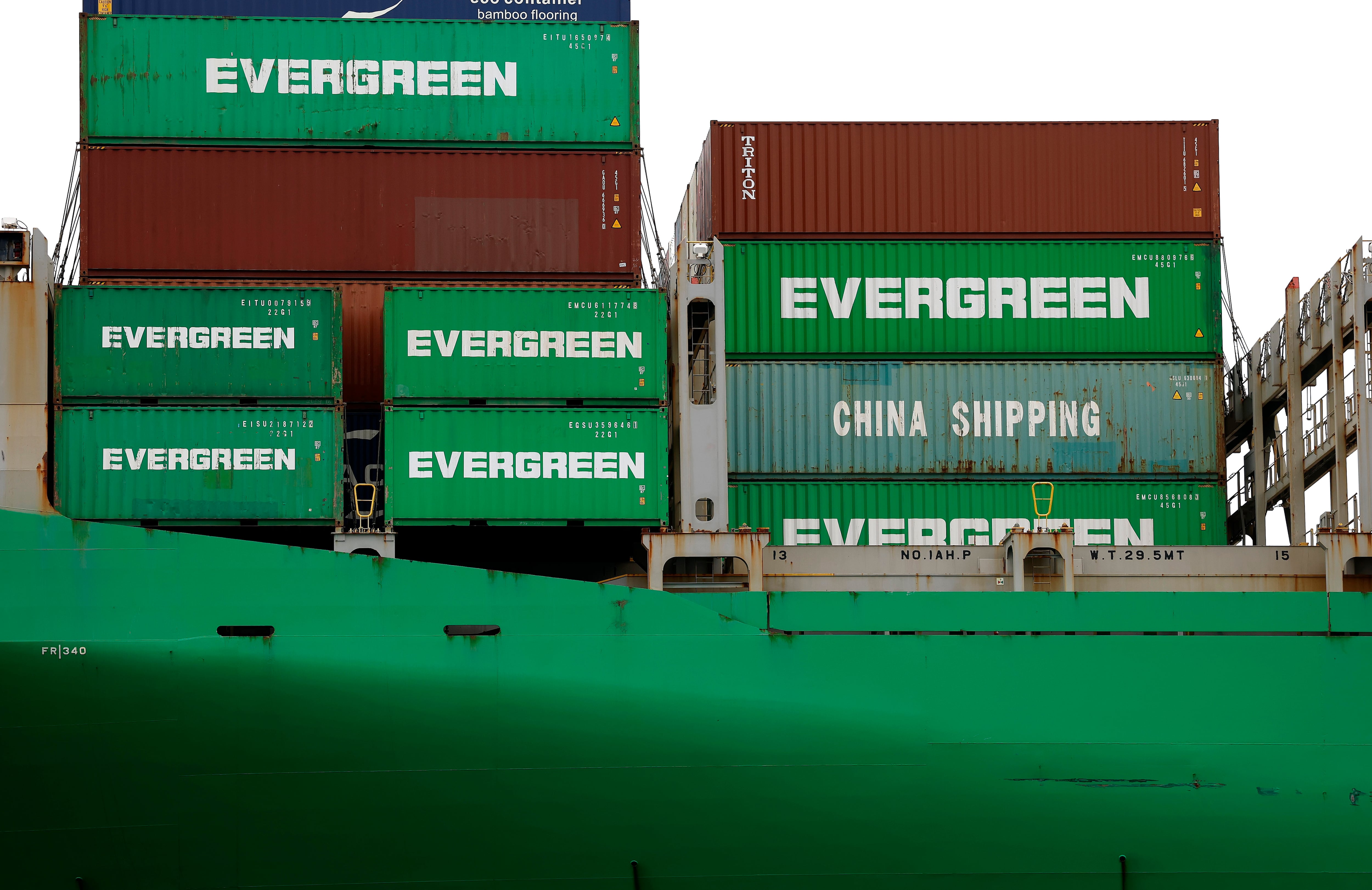 Shipping containers are stacked on a container ship docked at the Port of Los Angeles in California on May 6.