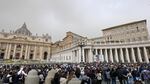 The crowd looks in direction of the window of the apostolic palace overlooking St. Peter's square during Pope Francis' prayer on April 1 in The Vatican.