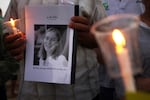 Palestinian children hold candles during a rally at a refugee camp in Rafah, in the southern Gaza Strip, in 2012, in memory of Rachel Corrie.