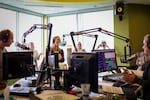 All Classical's Suzanne Nance with the other hosts of the radio station in a provided photo. All Classical staff say they must raise $6 million to build and equip new offices they plan to move to in 2024.