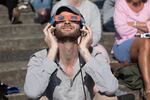 Portlanders enjoy the partial eclipse while jamming to eclipse playlists.