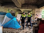 Municipal Police in Porto, Portugal regularly patrol areas used by drug consumers.  Police in Portugal don't arrest people who use drugs.  Instead they have a strong track record referring people in addiction to counseling and treatment.