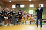 Democratic U.S. Senate candidate Texas state Rep. James Talarico speaks at a food drive at the Frederick Douglass Human Services and Justice Center.