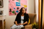 Cynthia Montoya sits in the living room of her home, where photographs and memories of her daughter, Juliana, surround her in Thornton, Colo.