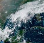 This GOES-16 GeoColor satellite image taken Saturday, Sept. 19, 2020, and provided by NOAA, shows Tropical Storm Beta, center,  in the Gulf of Mexico.  A hurricane watch is in effect Saturday for coastal Texas as Tropical Storm Beta gains strength.