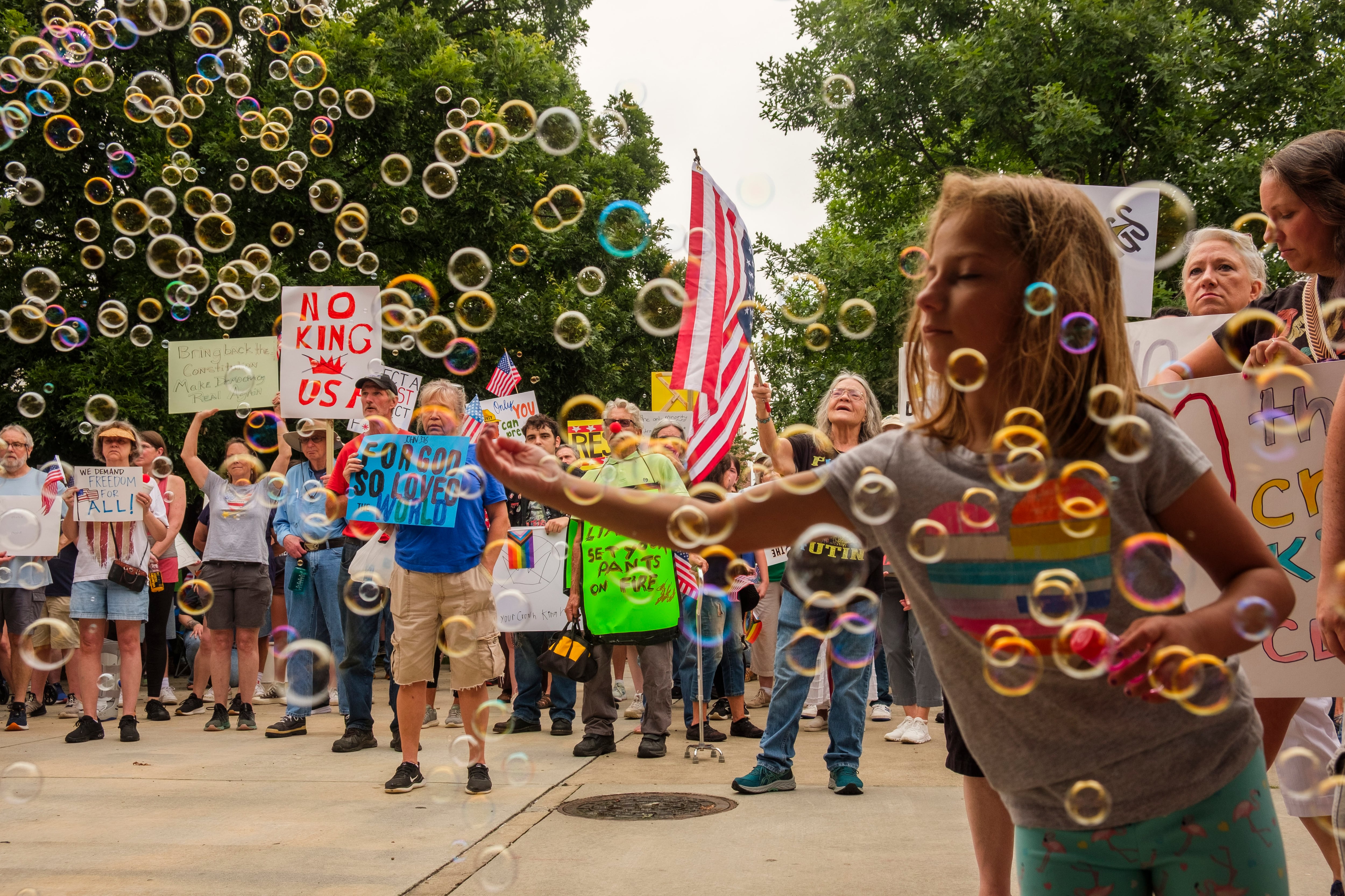 Macon, Ga.: People gathered Saturday in the same strip of downtown park used for a political rally nearly every weekend since the Hands Off protests in April.
