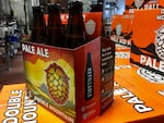 Double Mountain's new six-pack has a label letting customers know the bottles inside are refillable. The bottles themselves also have the word "refillable" stamped into the glass.