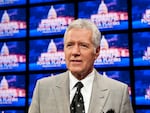 Jeopardy! host Alex Trebek is seen during a 2012 rehearsal. Next month, the U.S. Postal Service is releasing a Forever Stamp honoring Trebek, who died in 2020.