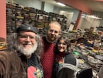 Film curators and archivists Greg Hamilton, Garrett Shroeder and Ioana Cherascu pose for a photo on February 9, 2025 after moving a massive collection of films into its new home at the Sunnyside Community Center in Southeast Portland. Hamilton, Schroeder and Cherascu are members of a volunteer-led effort to catalogue, preserve and show selections from thousands of reels of film amassed by film programmer Dennis Nyback, who died in 2022.