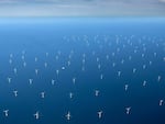 This aerial photograph taken on June 16, 2022, shows a wind turbine farm in the Baltic Sea, northeast of Rugen Island in Germany.