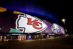 The Chiefs and Eagles logos are displayed at the Caesars Superdome on Monday.