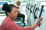 A driver's license applicant takes a knowledge test at an Oregon DMV office.