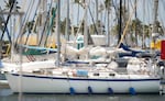 Oliver Widger's sail boat is shown docked at the Waikiki Yacht Club in Hawaii.