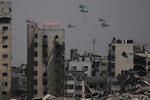Humanitarian aid is airdropped to Palestinians over Gaza City, Gaza Strip, Monday.