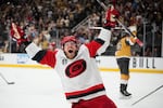 Carolina Hurricanes left wing Nikolaj Ehlers (27) celebrates after scoring an empty-net goal during the third period in Game 6 of the NHL hockey Stanley Cup Final series against the Vegas Golden Knights, Sunday, June 14, 2026, in Las Vegas.