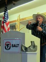 Mib Dailey, a rancher in Baker County, has served as the auctioneer for the Great Salt Lick auction and contest in Baker City since its launch in 2006. In this undated provided photo, he auctions off a salt lick at the Crossroads Carnegie Art Center in Baker City where the event was formerly held.