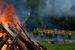 Incarcerated people train to “mop up” a fire at South Fork Forest Camp in Tillamook, Ore., on May 13, 2026.