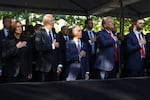 From left, Democratic presidential nominee Vice President Kamala Harris, President Joe Biden, Michael Bloomberg, Republican presidential nominee former President Donald Trump and Republican vice presidential nominee Sen. JD Vance, R-Ohio, attend the 9/11 Memorial ceremony on the 23rd anniversary of the Sept. 11, 2001 attacks, Wednesday, Sept. 11, 2024, in New York.