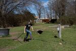 Mason Walton, 14, does chores at his family's home in Umatilla, Ore., in April 2026.