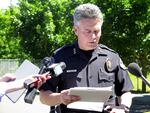 Vancouver Police Department Officer James McElvain talks with the press.