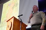 Deschutes County sherrif Ty Rupert addresses about 1,000 people at the Flat Fire community meeting in Sisters, Ore., on Aug. 25, 2025.