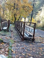 FILE - Two replacement footbridges were flown onto Eagle Creek Trail on Oct. 23, 2019, to replace Fern and High Creek bridges burned in the Eagle Creek Fire.