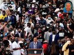 Human Rights Advocate Martin Luther King III, center at bottom, speaks at the Lincoln Memorial during the "Commitment March: Get Your Knee Off Our Necks" in Washington, D.C.