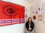 Megan Van Pelt stands in her dorm room in the University of Oregon's Kalapuya Ilihi residence hall. Van Pelt is a resident assistant for students who are part of UO's Native American and Indigenous Studies program living in the dorm.