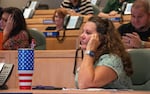 A poll manager listens to a presentation by the Committee for Safe and Secure Elections (CSSE) and the Georgia Secretary of State’s Office in the coastal Georgia town of Brunswick.