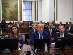 Former President Donald Trump sits in court with his attorneys Alina Habba and Christopher Kise during his civil fraud trial at New York State Supreme Court on October 24, 2023 in New York City.