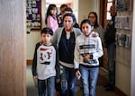 2017: Jeanette Vizguerra, who came to the U.S. without immigration documents, walks with two of her children as they seek sanctuary at First Unitarian Church in Denver, Colo. Vizguerra, who had been working in the U.S. for some 20 years, moved into a room in the basement of the church as she faced immediate deportation. Today, she continues working as an activist in the U.S.