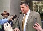 Kenneth Medenbach's attorney, Matt Schindler, tells reporters outside the courthouse that defendant Jason Patrick told him he has "respect" and "acceptance" for the verdict. A jury convicted Patrick of conspiracy. Medenbach was found not guilty last fall.