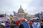 FILE - Rioters loyal to President Donald Trump at the U.S. Capitol in Washington, Jan. 6, 2021. 