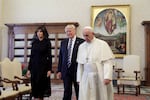 Pope Francis walks with President Trump and first lady Melania Trump during a private audience at the Vatican on May 24, 2017.