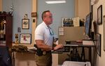 Chris Harvey, co-founder of the Committee for Safe and Secure Elections (CSSE) and deputy executive director of Georgia P.O.S.T., the state’s credentialing agency for law enforcement officers, stands at his desk in Austell outside of Atlanta.