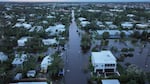 In this aerial view, Flood waters inundate a neighborhood after Hurricane Milton came ashore on October 10, 2024, in Punta Gorda, Florida. The storm made landfall as a Category 3 hurricane in the Siesta Key area of Florida, causing damage and flooding throughout Central Florida.