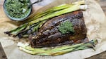 Coffee-rubbed salmon with charred leeks and chimichurri