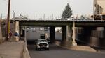 FILE - Traffic along Greenwood Avenue in Bend, Ore., on July 24, 2024.