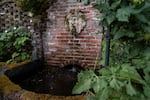 A water fountain in the garden.