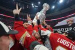 Florida Panthers left wing Matthew Tkachuk helps raise the Stanley Cup trophy after defeating the Edmonton Oilers in Game 6 of the NHL hockey Stanley Cup Final on Tuesday.