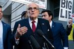 Former New York Mayor Rudy Giuliani speaks during a news conference after his defamation trial outside the federal courthouse in Washington, Friday, Dec. 15, 2023. A jury awarded $148 million in damages on Friday to two former Georgia election workers who sued Rudy Giuliani for defamation over lies he spread about them in 2020 that upended their lives with racist threats and harassment.